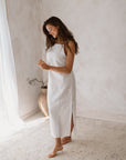 Women's white linen maxi, midi dress with pockets, sleeveless with straps, square neck, relaxed fit and perfect for spring summer